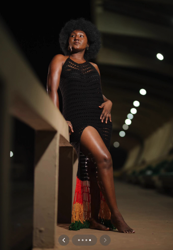 Model in elegant crochet dress